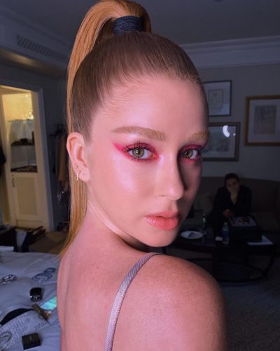 A blonde woman with pink eyeshadow in the shape of wings. (Photo: Hung Vanngo/Instagram)