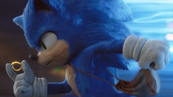 Sonic the Hedgehog running to the left holding a golden ring. (Photo: Paramount Pictures)