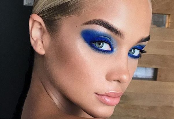 woman with bold, blue eyeshadow on. (Photo: Hung Vanngo/Instagram)