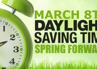 Green alarm clock with words beside it that say