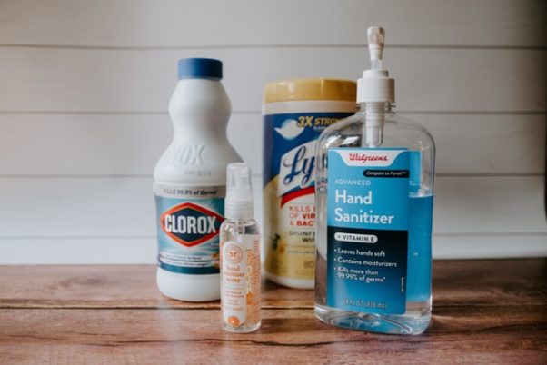 A bottle of Clorox bleach, Lyson disinfecting wipes and Walgreens hand sanitizer sitting on a counter. (Photo: Kelly Sikkema/Unsplash)