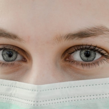 Closeup of a woman's eyes wearing a surigal mask. (Photo: Ani kolleshi/Unsplash)