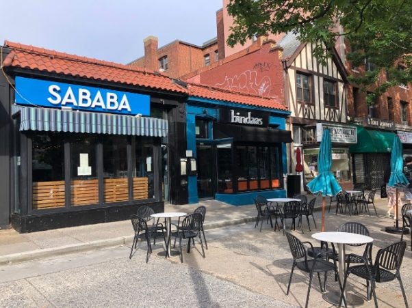 Tables and chairs set up on Connecticut Avenue in front of Sababa and Bindaas in Cleveland Park. (Photo: Ed Carley/Twitter)