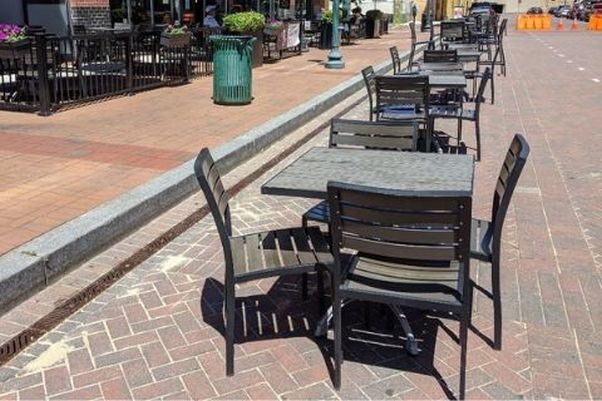 Tables and chairs set up on a brick street in Rockville. (Photo: Marylou Berg/City of Rockville)