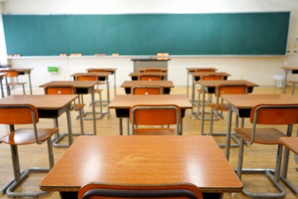 Photo of empty desks in a classroom. (Photo: Shutterstock)
