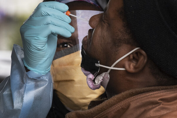A doctor performs a COVID-19 test on an unidentified Black man, during a testing drive at the Mt. Airy Church of God in  Philadelphia,Pa. on April, 24, 2020. (Photo: Jose F. Moreno/Philadelphia Inquirer)