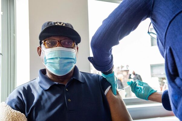 A Black man gets a COVID-19 vaccination in Hartford, Conn., on Jan 22, 2021. (Photo: AFP/Getty Images)
