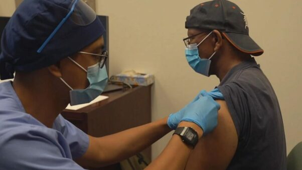 A Black man received a Moderna COVID-19 vaccine. (Photo: ABC News)