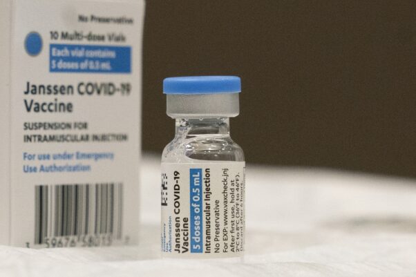 A vial of Johnson & Johnson's Jansen vaccine sitting beside its box. (Photo: Mark Lennihan/AP)