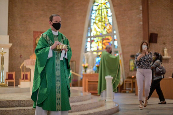 Bishop Michael Burbidge gives communion at St. Leo the Great in Fairfax on Sept. 13, 2020. (Photo: Catholic Diocese of Arlington)