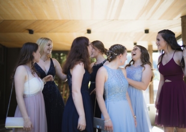 Several girls at prom. (Photo: Marcel Strauss/Unsplash)