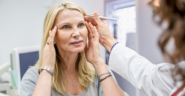 A woman getting a facelift consultation. (Photo: Alamy)