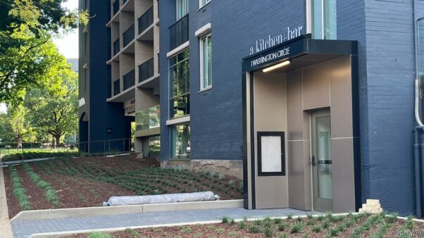 Outside entrance to a.kitchen+bar in the AKA Hotel Washington Circle with the restaurant's name above the door. (Photo: WBJ)