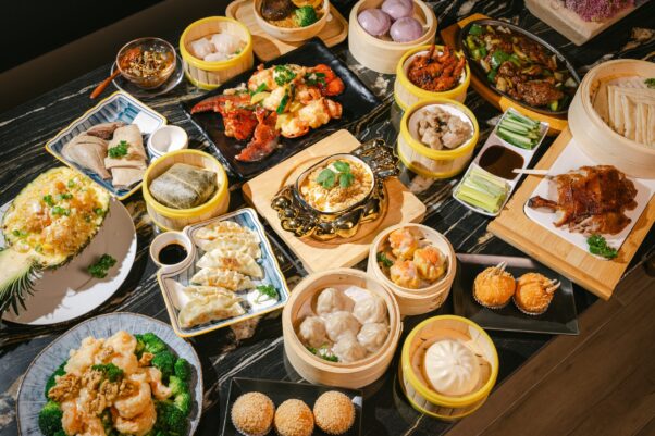 A table covered with several dishes of food from Han Spot including bao, steamed dumplings, pineapple fried rice and beef and broccoli. (Photo: Han Spot)