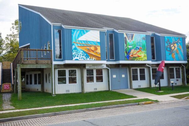 The exterior of Havre de Grace Maritime Museum painted blue with maritime murals painted on the side facing the parking lot. (Photo: Havre de Grace Maritime Museum/Facebook)