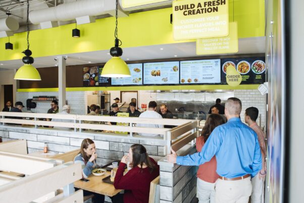 Interior of a California Tortilla with people waiting in line to order. (Photo: California Tortilla)