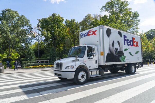 A special FedEx truck with a giant panda painted on the side beside the purple and orange FedEx logo arrives at the zoo on Connecticut Avenue NW Tuesday. (Photo: FedEx)