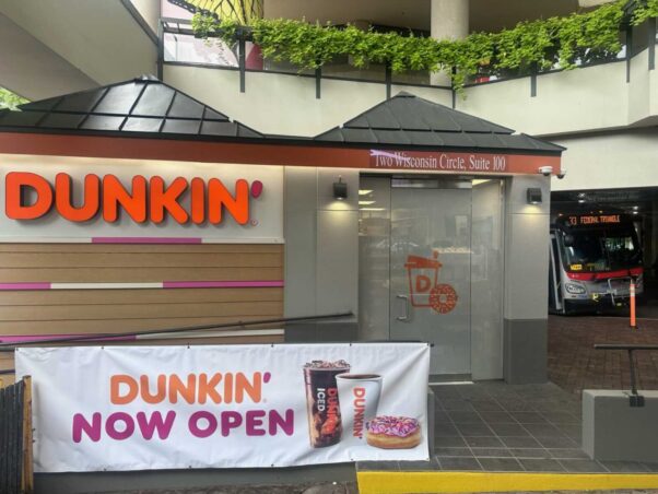 Exterior of the new walk-up Dunkin' in
Chevy Chase with a now open sign hanging on front. (Photo: Dunkin')