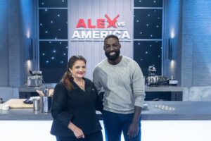 Chef Eric Adjepong (right) stand beside Chef Alex Guarnaschelli on the set of Food Network's Alex vs Ameria. (Photo: Eric Adjepong/Facebook)