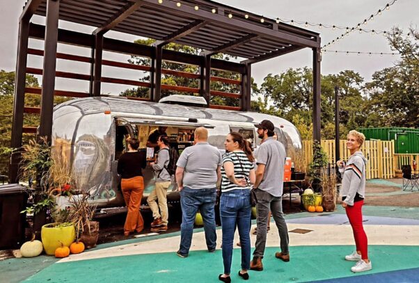 A line of people waiting at Juneberry Garage's silver Airstream trailer to get drinks. (Photo: Bryanw/Instagram)