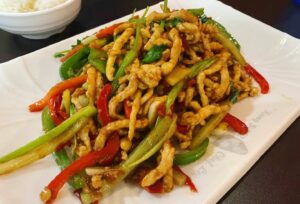 Kung Fu 12's shredded pork with spicy garlic, green and red peppers, and green onions. (Photo: Kung Fu 12/Facebook)