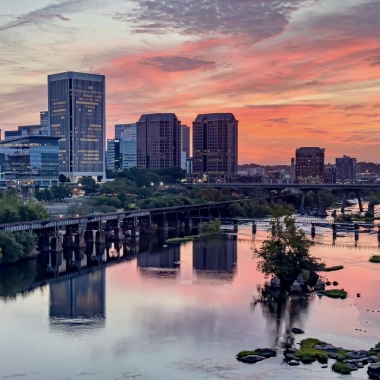 The Richmond skyline at dusk with the James River in the foreground. (Photo: Bill Draper Photography/Flickr)