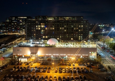Union Market at night with Hi Lawn's dome on the roof. (Photo: Hi Lawn)