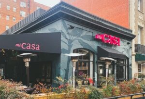 Exterior of Mi Casa in daylight with red letters above door. (Photo: Caitlin P./Yelp)
