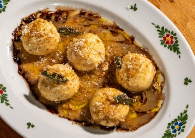 Gnudi, round ricotta dumplings cooked in brown butter and sage, then sprinkled with crumbled amaretti cookies. (Photo; Nina Palazzo)