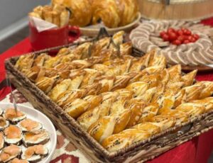 3 trays, a cup and a basked filled with different pastries. (Photo: Baku Delicious/Facebook)