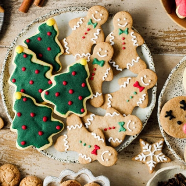Top view of variety of gingerbread cookies presented on festive table for Christmas celebration. (Photo: alvarez/iStock)