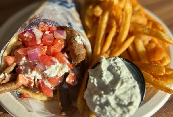Gyro, fries and tzatziki sauce on a plate. (Photo: Big Greek Cafe)