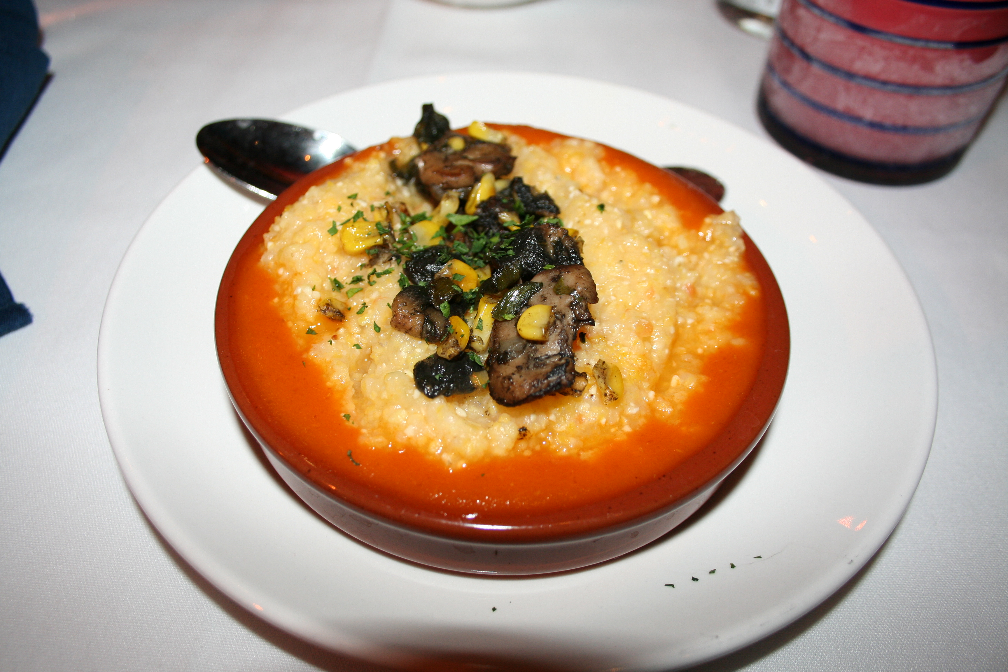  tamale con huitlacoche en cazuela: Corn meal topped with huitlacoche and salsa ranchera (Photo: Mark Heckathorn/DC on Heels)