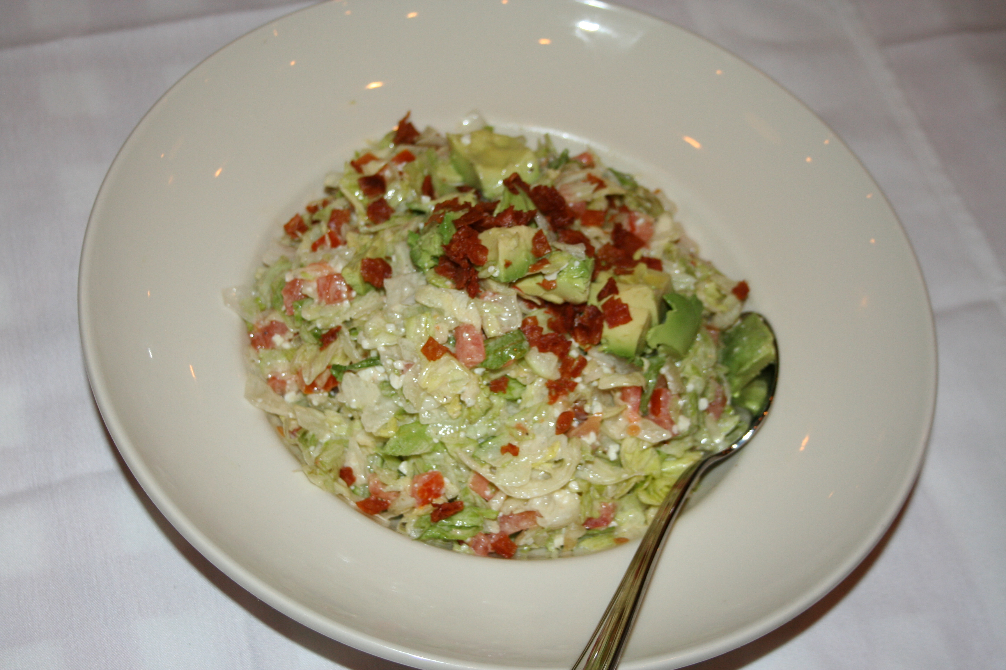 Chopped salad with crispy prosciutto, tomatoes, blue cheese, avocado and house dressing (Photo: Mark Heckathorn/DC on Heels)