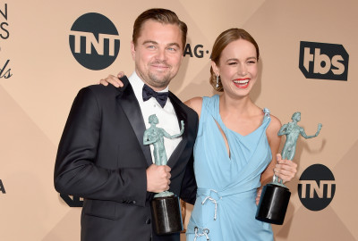 Actor Leonardo DiCaprio (left), winner of the award for Outstanding Performance by a Male Actor in a Leading Role for 