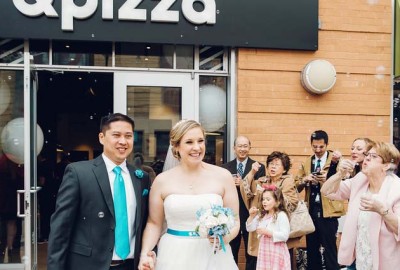 Jon Julio and Jennifer Bester leave &pizza after their wedding Monday. (Photo: Rachel Couch for Pop! Wed Co.)